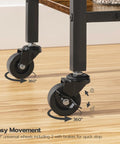 Close-up of 360° swivel wheels on the Slick 3 Tier Rolling Bar Cart With Ultra Smooth Swivel Wheels Rustic Brown Finish.