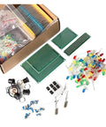 Epic Electronic Component Kit Bundle With Capacitors, Resistors, LEDs, Transistors, Diodes, and PCBs spread on a surface