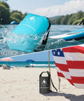Dry Bag Waterproof Backpack Roll Top With Double Zipper Seal, 5L black bag on beach and 20L sky blue bag floating on water