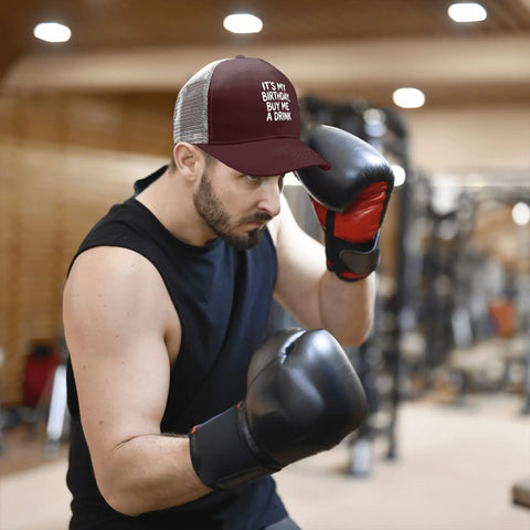 Man boxing wearing Its My Birthday Trucker Hat Unisex Cool Baseball Cap with Modern Design and Adjustable Buckle