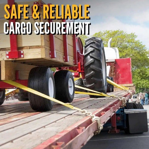 Beefy Heavy Duty Chain Ratchet Straps 2 Inch X 27 Foot used on flatbed securing tractor with chain ends and grab hooks.