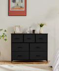 No-Fuss Seven Drawer Fabric Dresser With Bonus Storage Bins For Bedroom Organization And Durable Wooden Top, 39.6x11.8x30.4 inches.