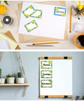 Lemon Themed Classroom Name Tags Set Of 48 Self Adhesive Desk Nameplates displayed on desk and board with personalized names.