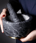 Holding Granite Mortar And Pestle Set With Gold Base For Grinding Spices Nuts And Herbs To Unlock Bold Flavor Make Fresh Guac Salsa Pesto