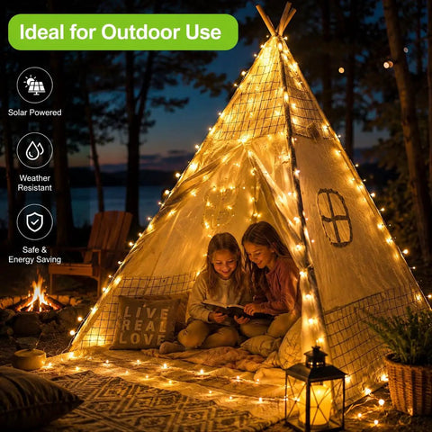 Outdoor Solar String Lights With 100 LEDs 33 Feet 8 Modes Weatherproof Fairy Lights illuminating a tent in a cozy backyard setting.