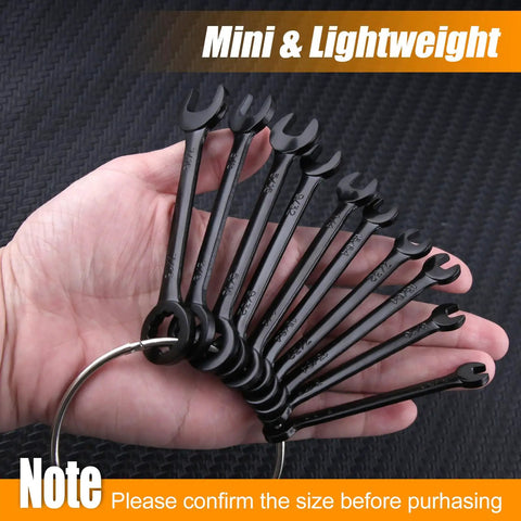 Backyard Mechanic Mini Wrench Set Packed With Metric And Sae Sizes 20 Piece showing mini steel spanners on a ring held in hand.