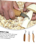Person using Top Shelf Steel Carving Knife Set Featuring Three Razor Drawknives on wood for detailed carving.