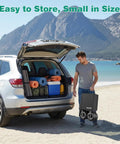 Heavy Duty Beach Wagon With 9 Inch Balloon Wheels, 550 Lb Capacity, folded next to SUV at beach, easy to store.