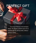 Black gift box with red ribbon, hand holding water glass, perfect gift text, cup and saucer on dark tabletop.