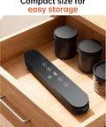 Powerful 75kPa Vacuum Sealer For Food Storage, Compact 4 In 1 Machine in drawer, digital timer, black design, easy to store