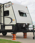 RV stabilized with Trailer Jack Block 2000 Lbs Capacity Per Block For No Sweat RV Leveling Polypropylene Camper Stabilizer Blocks
