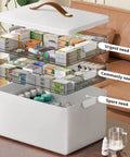 Must Have Three Tier Medicine Organizer With Leather Handle Portable Cabinet For Pills And First Aid Supplies For Home Storage Keeps Meds Neat And Accessible Great For Countertop Or Nightstand with open compartments showing various medical supplies inside.