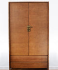 Wooden cabinet with brass hardware featuring brass round corner cabinet backplate strip 4.1 inch overall assembly with pull for doors.