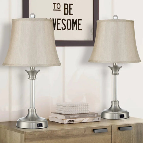 Set Of 2 Silver Touch-Activated Bedside Lamps With Dual USB Ports, modern design on wooden nightstand, beige shades.