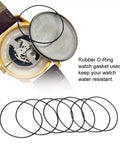 Pro Grade 200 Pcs Watch Gasket Kit 0.6mm Rubber O Rings Set shown with open watch back cover.