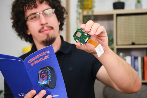 Clockstar 2.0 DIY Smartwatch Kit build with circuit board and creators booklet for STEM electronics learning
