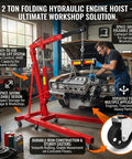 Heavy Duty Folding Hydraulic Engine Hoist With 4400 Lbs Capacity Cherry Picker Crane in workshop lifting an engine.