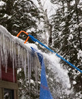 Roof Snow Rake With Seventeen Inch Wide Head And Fifteen And A Half Foot Telescoping Pole For Quick Snow Removal From The Ground No Fuss Snap Together Assembly With Four Fiberglass Handles Ideal Roof Clearing Tool Assembled In The USA clearing snow from a roof