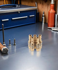 Hot Deal 10pcs Alloy Welding Torch Contact Tip Holder Diffuser Assembly For Mig Mag Guns on workbench with tools.