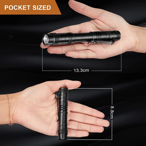 Hands holding 12 Pack Mini LED Pen Flashlights With Clip, Ultra Compact 3.5 Inch and 5.24 Inch, showing size comparison.