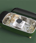 Compact 40khz Ultrasonic Cleaner For Jewelry And Personal Care Devices Straight Up Deep Cleansing Machine with silver jewelry and a watch inside.