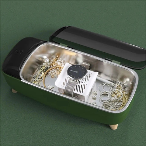 Compact 40khz Ultrasonic Cleaner For Jewelry And Personal Care Devices Straight Up Deep Cleansing Machine with silver jewelry and a watch inside.