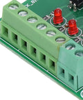 Close-up of terminal connectors on Optocoupler Isolation Board 24V To 5V PLC Level Converter Module 4 Channel Plug And Play Ready