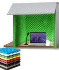 Portable Vocal Recording Booth Desktop Soundproof Foam Shield Vocal Isolation Panel with green acoustic panels around a laptop.