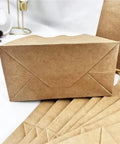 Kraft Paper Gift Bags 150 Pieces Durable Recyclable Party Favor Bags for Birthday Gifts Candy Treats Shopping Groceries shown folded