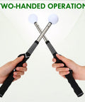 Six Pack Retractable Golf Swing Trainer Set With Click Feedback held in two hands for two-handed operation