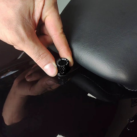 No Sweat Quick Swap Rear Seat Bolt Featuring Carbon Fiber Knob and Aircraft Grade Aluminum being installed on a motorcycle seat.