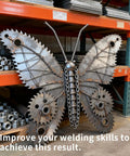 Metal butterfly sculpture on a shelf made of gears and rods, showcasing welding skills and creativity in a workshop setting.