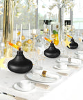 Indoor scene with Six Pack Metal Table Top Torches For Outdoor Use Citronella Fueled Refillable Flame Lights With Wicks And Covers