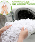 Hands placing a white cotton dust mop head in a washing machine, showcasing Three Pack 36 Inch Cotton Dust Mop Heads Commercial Refill Hella Thick Cotton Loop No Sweat Swapping Killer Absorbency For Warehouse And Hallway Floors Always.