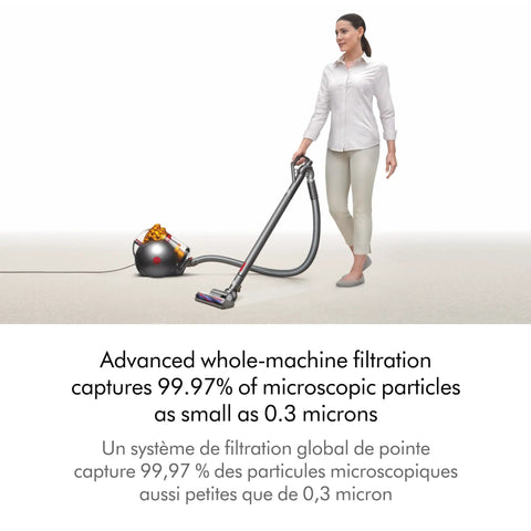 Person using Big Ball Turbinehead Vacuum Cleaner With 250 Air Watts Suction And Ball Steering For All Floor Surfaces on carpet
