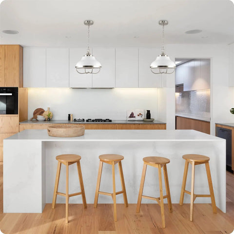 Ezra 14 Inch 3 Light Modern Pendant Light With White Metal Shade And Brushed Nickel Finish over a kitchen island