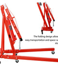 Hella Sturdy Heavy Duty Hydraulic Engine Hoist Crane Two Ton Four Thousand Pounds Capacity Folding Cherry Picker in red with swivel casters.