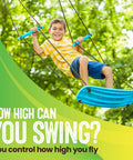 Boy swinging on Kick Stand Up Tree Swing For Backyard And Outdoor Swingsets Kid Friendly Platform Swing With Adjustable Handles