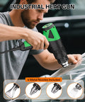 1800W Industrial Heat Gun With Lightning Fast Heat Up 122F To 1202F Variable Temperature Control held by person on vinyl wrap