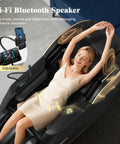 Person relaxing in 4D Full Body Massage Chair For Next Level Comfort With SL Track Shiatsu Zero Gravity Recliner AI Control Heating.