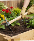 Gardener using 2 In 1 Garden Hoe And Pickaxe With Wooden Handle Heavy Duty Weeding And Digging Tool for planting beds