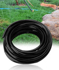 10M Garden Drip Irrigation Hose Kit, PVC Flexible Tubing 8 To 11 mm, black coil on lush green lawn