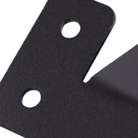 Close-up of a corner bracket from the 4 Piece Heavy Duty Metal Mounting Bracket Set For Black Wall Plate Cleats For Workbenches, Garages, And Workshops.