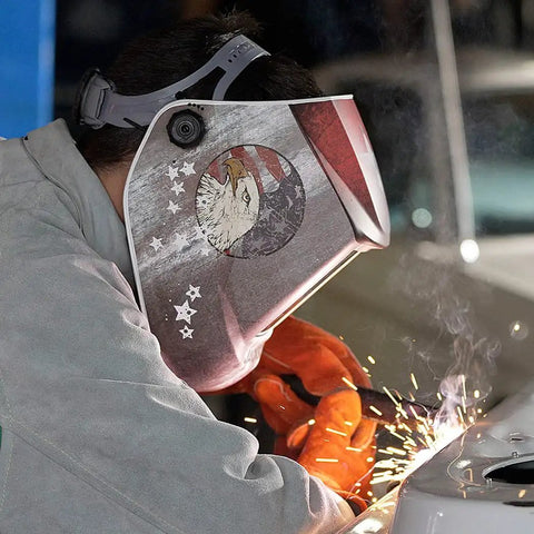Person welding with Ultra Lightweight Auto Darkening Welding Hood With Premium Graphic Design Weighing 1.24 Lbs And Ergonomically Balanced