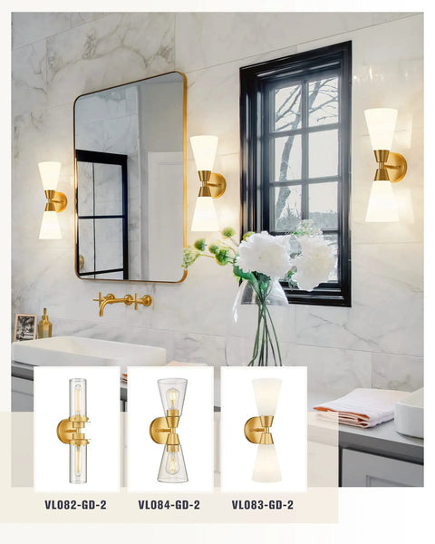 Brushed Gold Vanity Light Fixture Over Mirror With Frosted Milk Glass Sconce in modern bathroom setting.