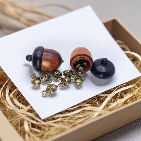 Hella Slick Screw Open Miniature Black Ebony Acorn Curios Set Of Two With Hidden Antique Bronze Pinecones, showing open acorns and pinecones.