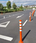 Heavy Duty Flexible Bollard Built Damn Tough For Busy Parking Lots Takes Serious Beating And Springs Back Orange And White High Visibility Traffic Barrier No Fuss Outdoor Setup Solid Heavy Duty Road Guard in parking lot