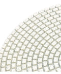 Close-up of a 7 Inch Diamond Polishing Pad Made For Granite And Marble, showcasing textured surface for effective buffing.