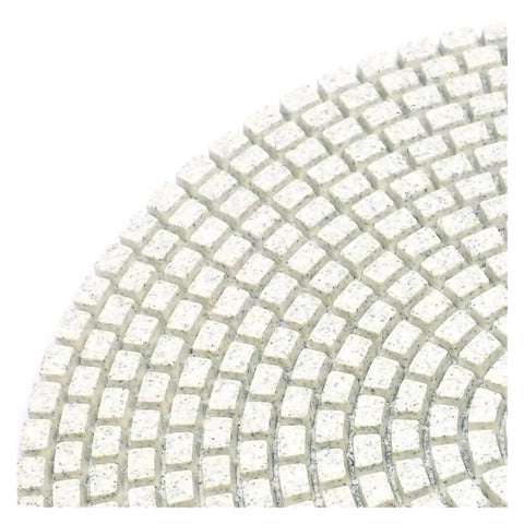 Close-up of a 7 Inch Diamond Polishing Pad Made For Granite And Marble, showcasing textured surface for effective buffing.
