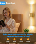 Gold Battery Operated Wall Sconces Set Of 2 Peel And Stick Magnetic Linear Lights in bedroom with woman reading